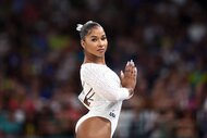 Jordan Chiles wears a white leotard at the 2024 Paris Olympics.