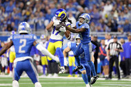 Los Angeles Rams catches a pass against the Detroit Lions during an NFL game