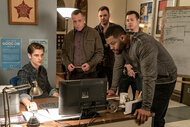 Kevin Atwater and the squad look at a computer on Chicago P.D. Season 3 Episode 21.