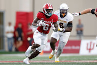 Indiana Hoosiers running back Justice Ellison runs with the ball during a college football game against the Western Illinois Leathernecks