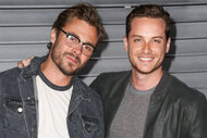 Patrick Flueger and Jesse Lee Soffer pose together on the red carpet