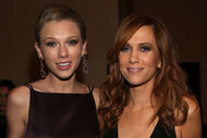 Taylor Swift and Kristen Wiig smile together in black dresses.Amy Poehler attends the "In Conversation with Amy Poehler" event during Vivid Sydney at Sydney Opera House on May 27, 2024 in Sydney, Australia. (Photo by Don Arnold/WireImage)