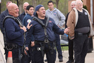 Randy Flagler as Capp and real life firefighter Anthony Ferraris as Tony in Chicago Fire.