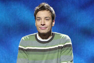 Jimmy Fallon sits on a stool during a sketch on saturday night live