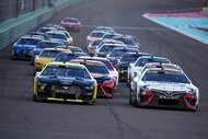 Nascar drivers on the track during a race during the NASCAR Cup Series 4EVER 400