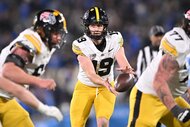 Iowa Hawkeyes football team plays a game.