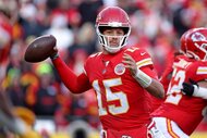 Patrick Mahomes #15 of the Kansas City Chiefs holds the ball during a game.