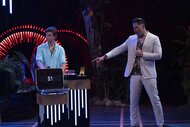 Joe Manganiello points to a $1 briefcase on Deal or No Deal Island Episode 201.