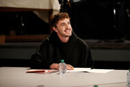 Paul Mescal sits at a table during promos for Saturday Night Live Season 50 Episode 8