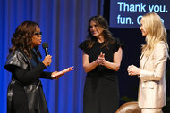 Oprah Winfrey, Mariska Hargitay and Amy Griffin speak together onstage.