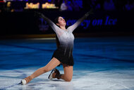 Isabella Aparicio kneels on the ice during the Legacy On Ice U.S. Figure Skating Benefit