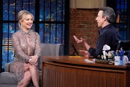 Kate Hudson smiling and talking with Seth Meyers on Late Night With Seth Meyers Season 12, Episode 67.