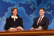 Mikey Day dressed as a 19th century lord with Colin Jost.