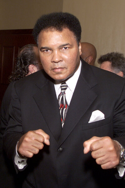 Muhammad Ali wearing a suit at at 'ROAST THIS! An Evening with Muhammad Ali and Friends