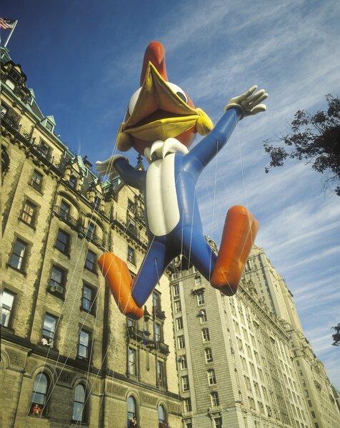 A Woody Woodpecker Balloon floats in NYC.