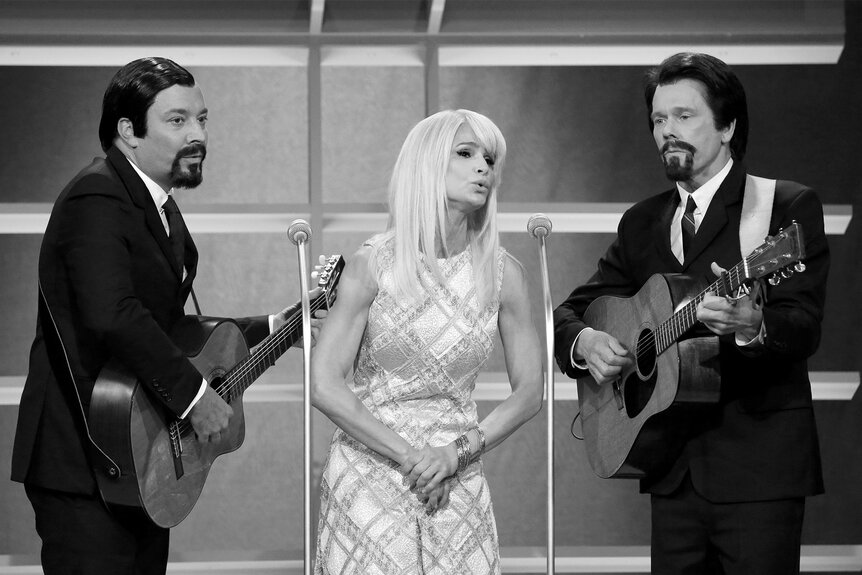 Jimmy Fallon performing "Blowin' in the Wind" with actors Kyra Sedgwick and Kevin Bacon