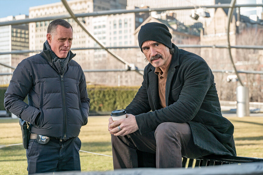 Hank Voight and Alvin Olinksy have a talk in a park