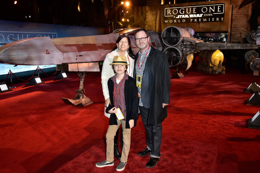 Rainn Wilson poses with wife Holiday Reinhorn and son Walter Mckenzie Wilson on the red carpet.