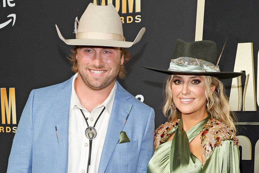 Lainey Wilson and Devlin Hodges wear cowboy hats at the Academy Of Country Music Awards