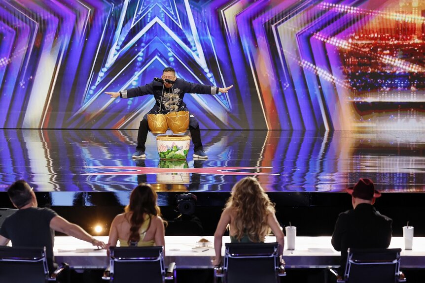 Bao Cuong performs onstage on America's Got Talent Episode 1902.