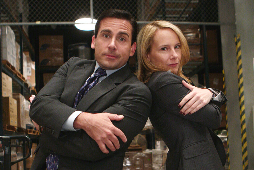 Steve Carell as Michael Scott and Amy Ryan as Holly Flax pose together