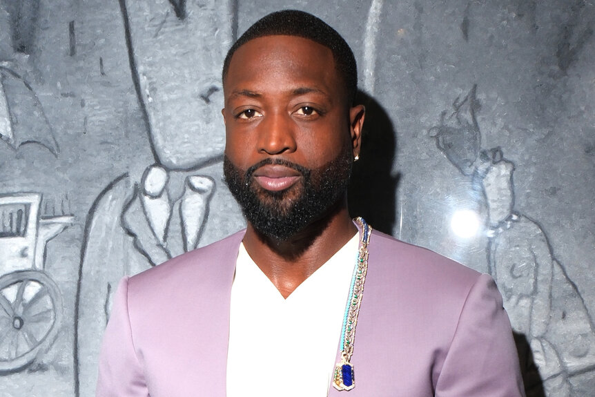 Dwyane Wade wears a purple suite to the 2024 met gala