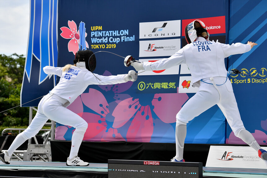 France's Elodie Clouvel (R) competes with Russia's Anna Buriak (L) during the women's individual event of fencing at the UIPM World Cup.