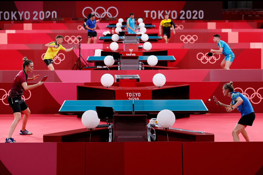 Several table tennis games happen simultaneously at the 2020 Tokyo Olympic Games
