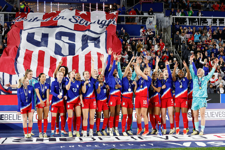 US Women's National Team celebrates their win.