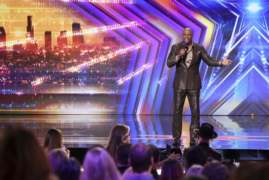 Terry Crews speaks on stage on America's Got Talent Episode 1903.