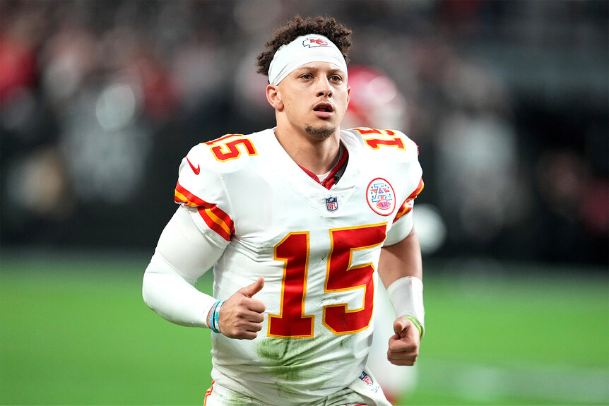 Patrick Mahomes runs on the field during a football game