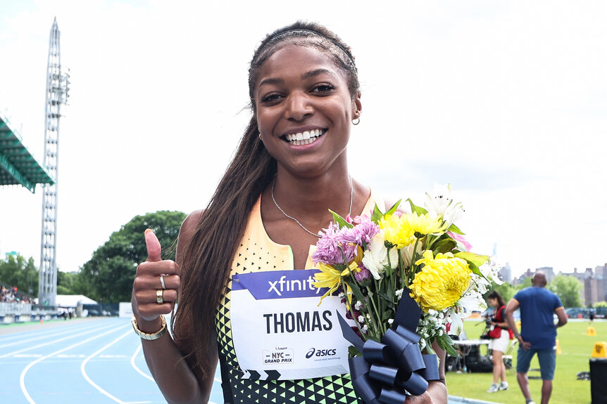 Gabby Thomas smiles after winning the women's 200m during the 2024 USATF NYC Grand Prix