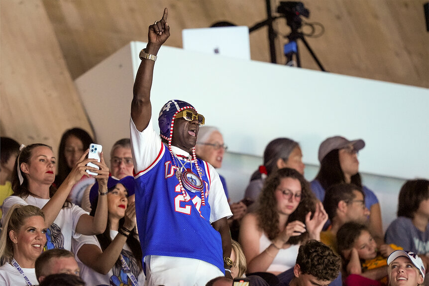 Flavor Flav cheers on the womans water polo team at the 2024 Olympics