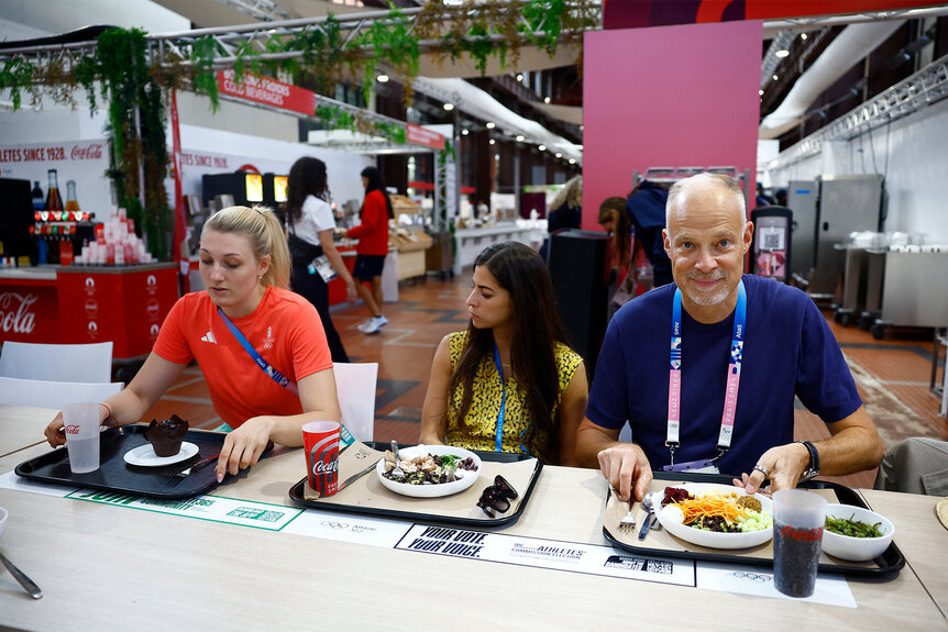 Hungary Minister of Defense and Sport Kristof Szalay-Bobrovniczky enjoy a meal together at the 2024 olympics