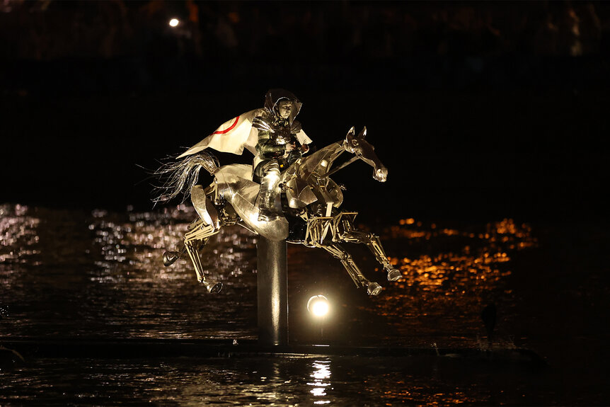 The Horsewoman rides through the Siene River at the 2024 Olympics Opening Ceremony