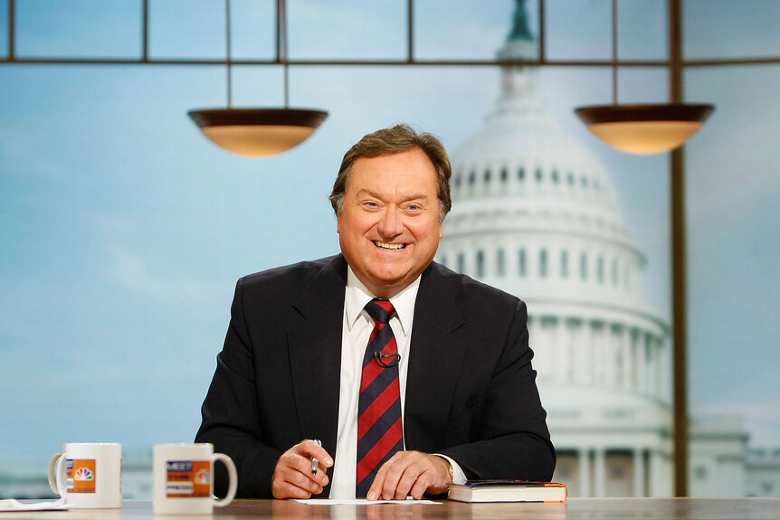 Tim Russert smiles during a taping of Meet the Press at the NBC studios September 16, 2007