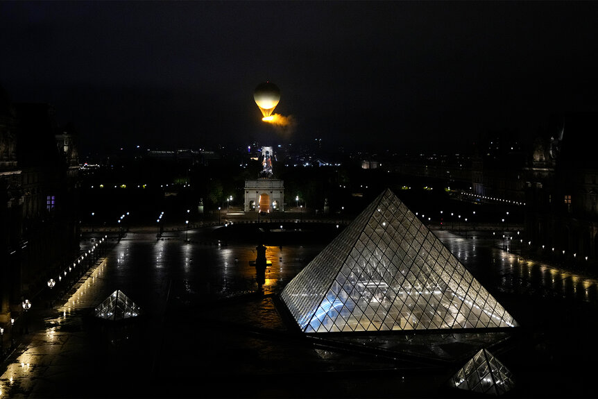 The Olympic Flame Balloon in the air at the 2024 Olympic Opening Ceremony