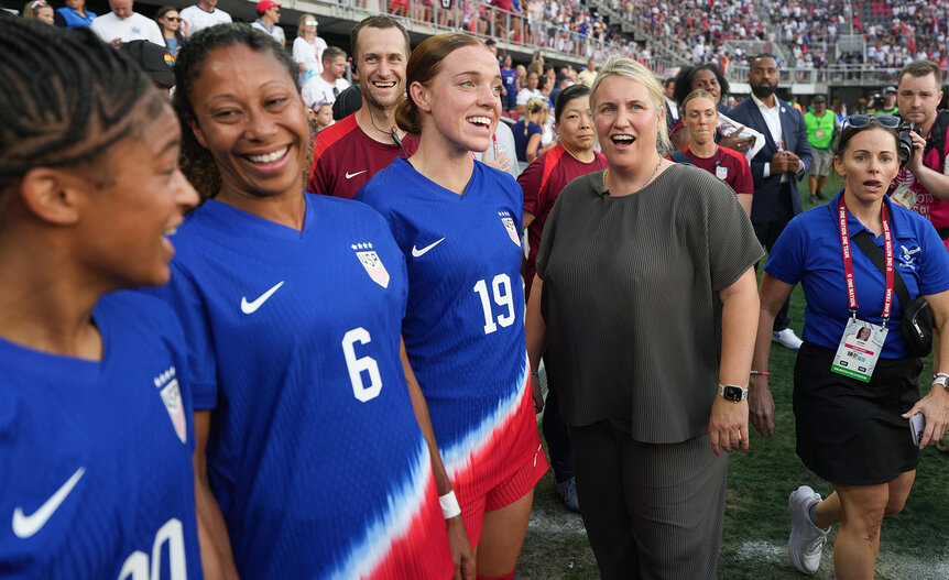 United States head coach Emma Hayes talks with players prior to playing Costa Rica