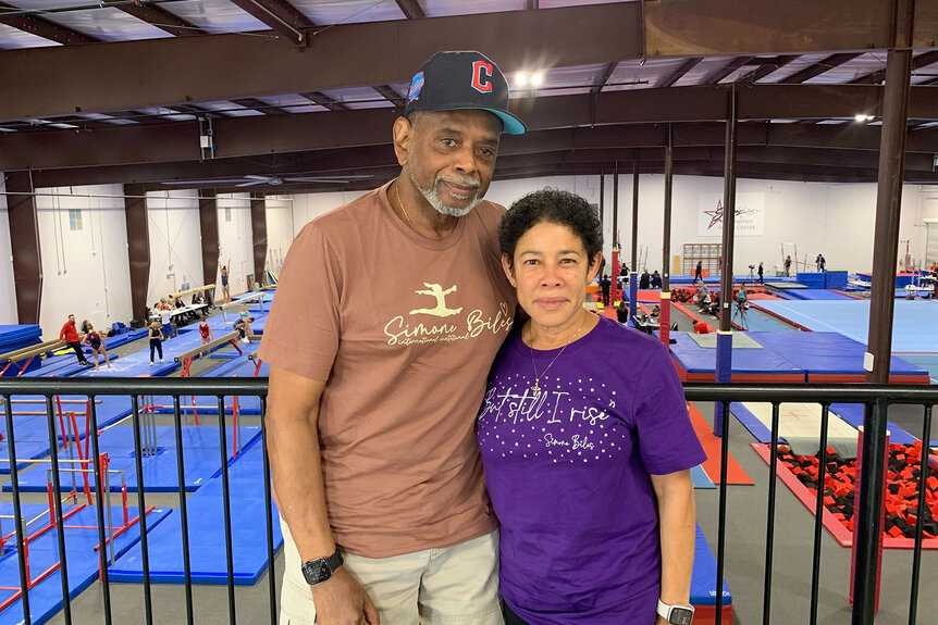 Ron and Nellie Biles pose for a photo at a USA Gymnastics World Team selection event
