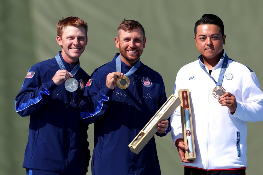 Vincent Hancock poses with his gold medal at the 2024 Olympics