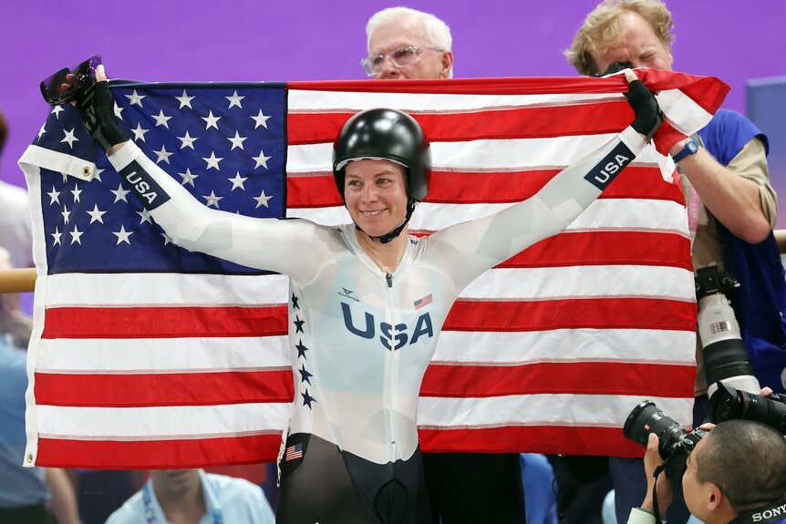 Jennifer Valente celebrates winning a gold medal at the 2024 Olympics