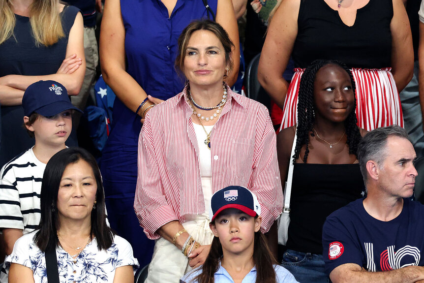 Mariska Hargitay sits next to August Miklos Friedrich Hermann and Amaya Josephine Hermann at the Paris 2024 Olympic Games