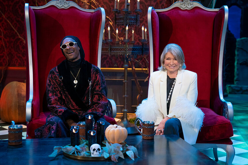 Martha Stewart and Snoop Dogg sit together during 'Snoop & Marthas Tasty Halloween'.