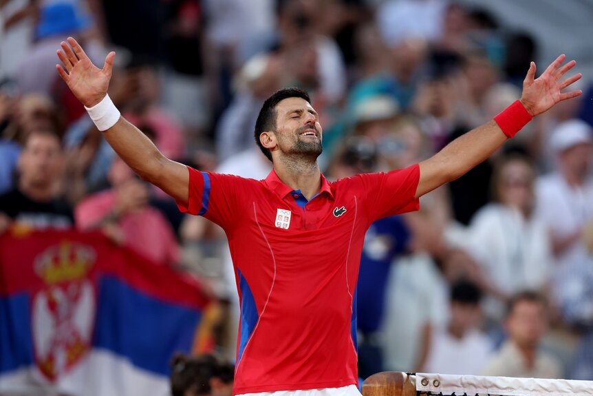 Novak Djokovic celebrates his men's tennis semifinal win at the 2024 Olympics