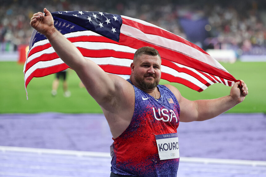 Silver medalist Joe Kovacs of Team United States celebrates following the Men's Shot Put Final at the Paris 2024 Olympics