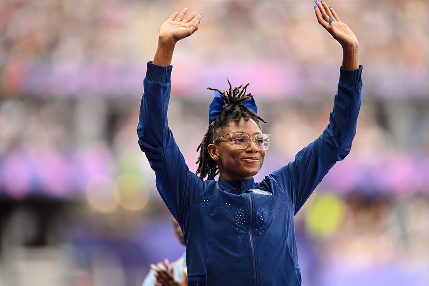 Bronze medalist Melissa Jefferson of USA gestures during the women's 100 meter medal ceremony at the Paris 2024 Olympics