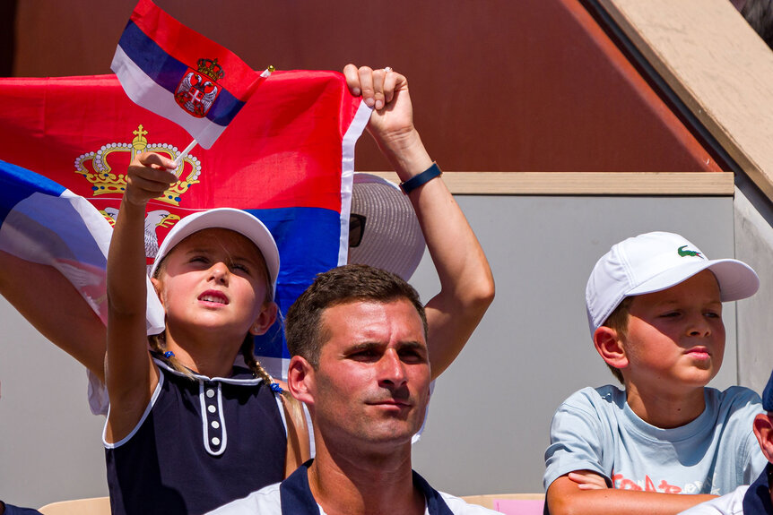 Novak Djokovic's daughter, Tara Djokovic (L) and son, Stefan Djokovic support Novak Djokovic against Rafael Nadal of Team Spain during the Men's Singles second round match of the Olympic Games Paris 2024