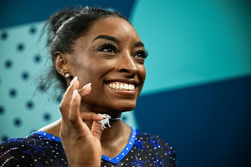 The Message Behind Simone Biles' G.O.A.T. Necklace (PHOTOS) | NBC Insider