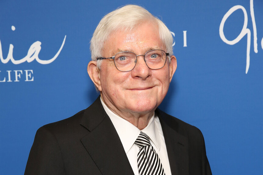 Phil Donahue smiles on the red carpet