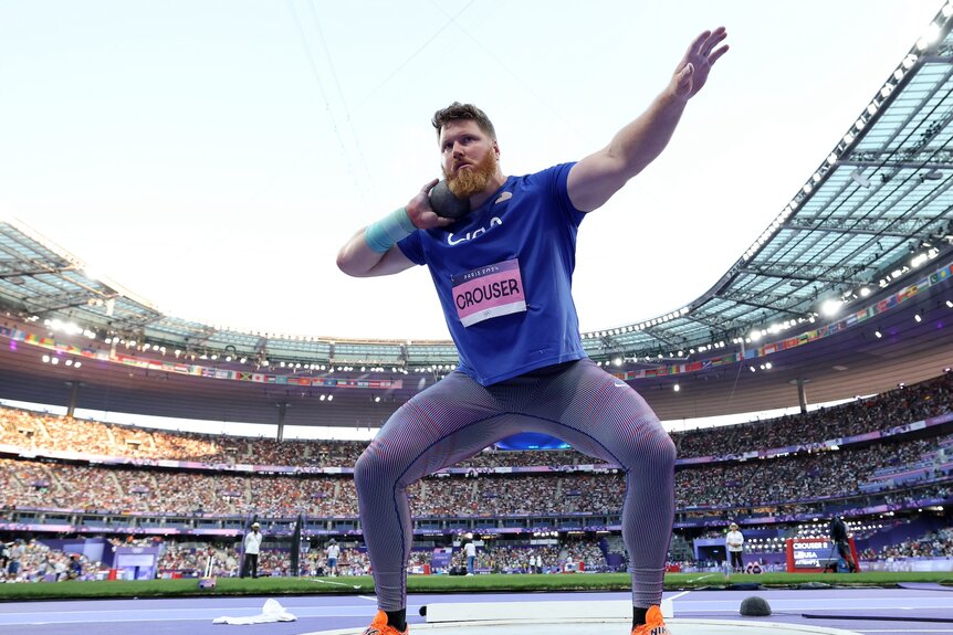 Ryan Crouser competes in the men's shot put at the 2024 Olympics